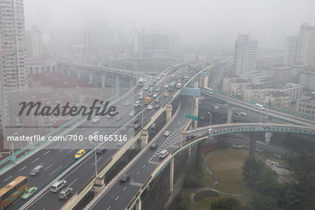 Elevated roadways meet in the mist, Changning Qu, Shanghai, China Elevated roadways meet in the mist, Changning Qu, Shanghai, China