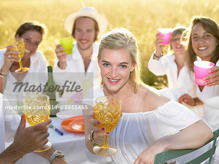 Group of people having dinner, outdoors