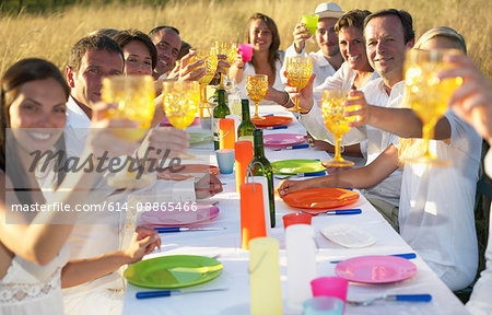 Group of people having dinner, outdoors