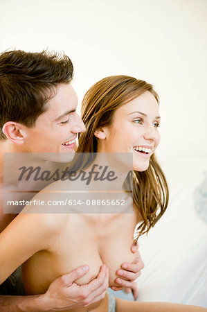 Young couple hugging and kissing