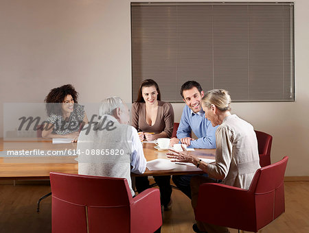 Group of people at boardroom table