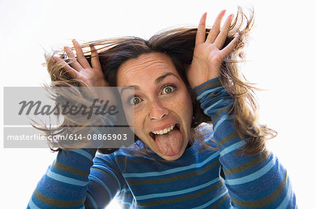 Woman making funny face at camera