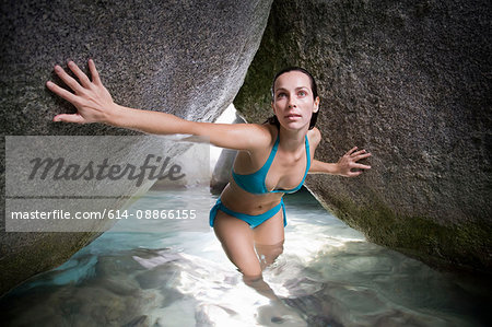 Woman Exploring Cave