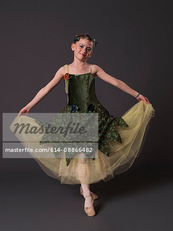 Ballerina in green dress.