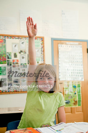 Elementary School Student Raising Hand