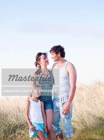 family together at the beach