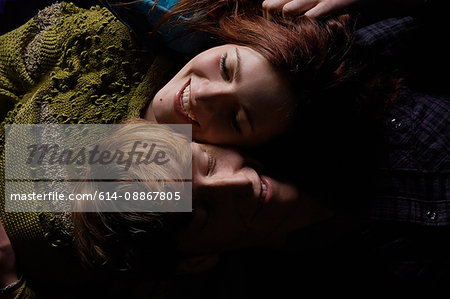 Close up of teenage couple smiling