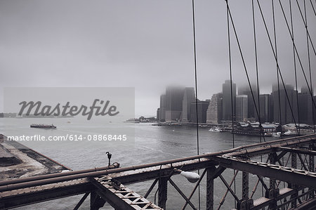 Foggy cityscape viewed from bridge