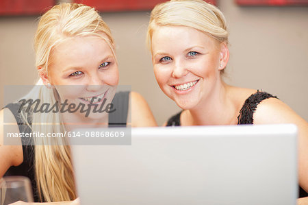 Twin businesswomen working together