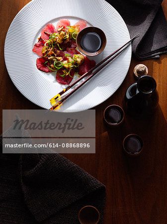 Plate of steak carpaccio with sauce