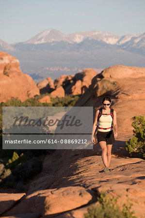 Hiker exploring rock formations