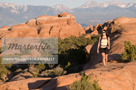 Hiker exploring rock formations