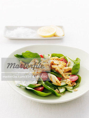 Plate of salad with croutons