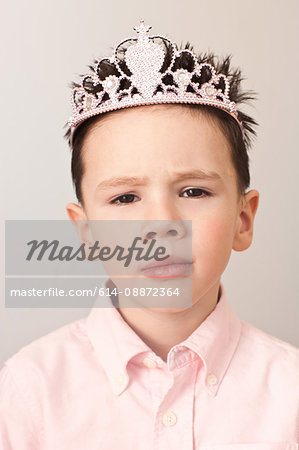 Portrait of a boy wearing a tiara