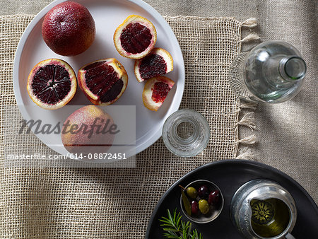 Blood oranges on plate