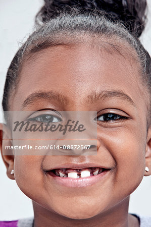 Girl smiling with gap tooth