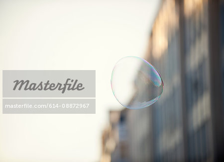 A bubble floating in an urban environment