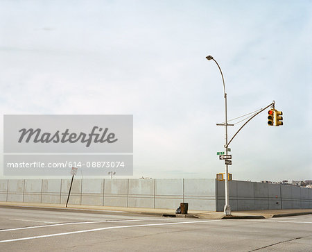 Empty street with traffic lights