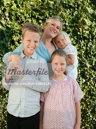 Family smiling together, portrait