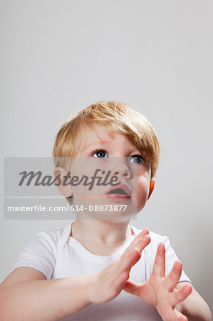 Boy gesturing with hands