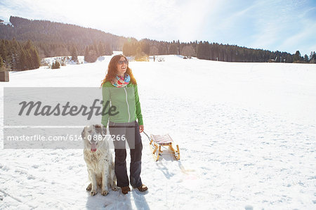 Woman bonding with pet dog