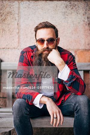 Portrait of man with beard wearing sunglasses