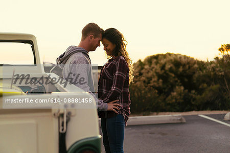 Romantic couple with pickup truck at Newport Beach, California, USA
