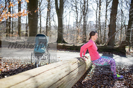 Woman exercising in forest