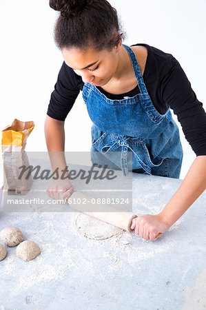 Teenage girl baking