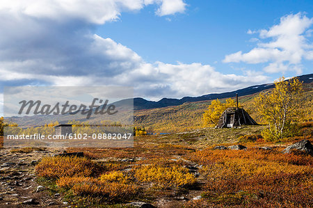 Wooden buildings in rural landscape