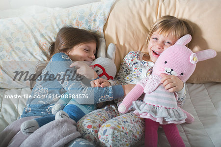 Sisters on bed