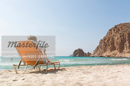 Woman relaxing on beach