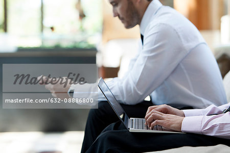 Business professionals using wireless devices