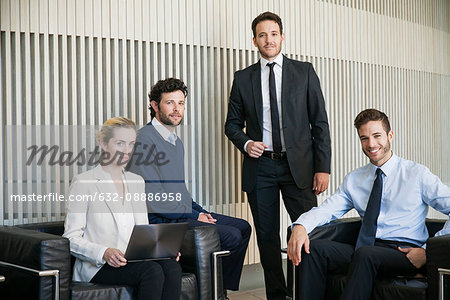 Business team members, portrait