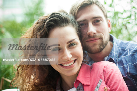 Couple together outdoors, portrait