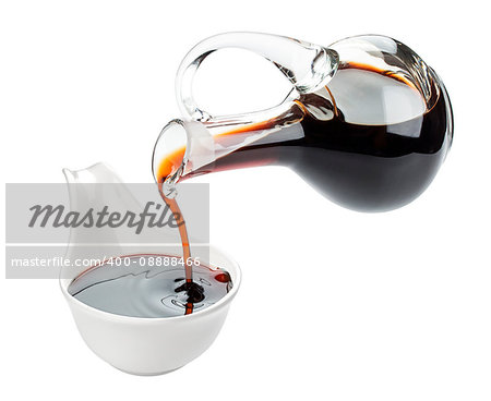 Soy sauce and chopsticks isolated on white background, with clipping path