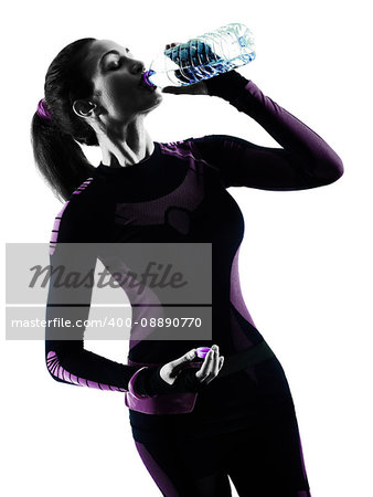 one young caucasian woman runner running jogger jogging drinking water isolated silhouette shadow on white background