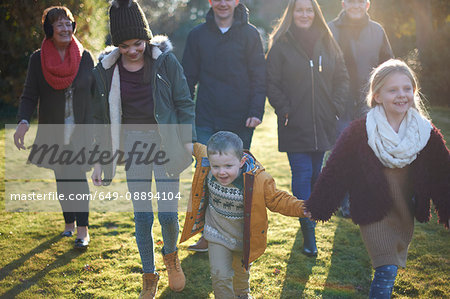 Family enjoying sun in garden