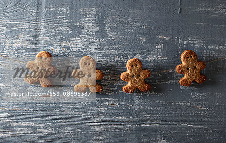 Gingerbread man cookies on a string