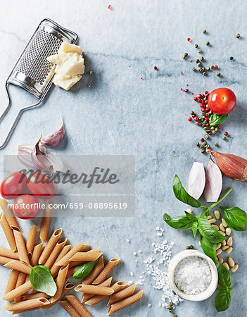 An arrangement of assorted ingredients for pasta dishes (from above)