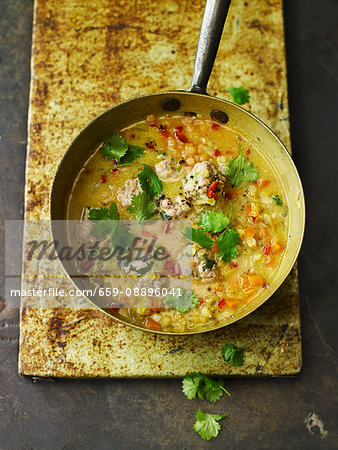 Spicy Red Lentil, Coconut, and Coriander Soup with Chicken Dumplings