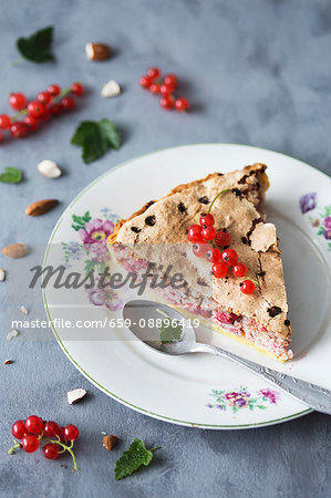 A slice of redcurrant and almond tart
