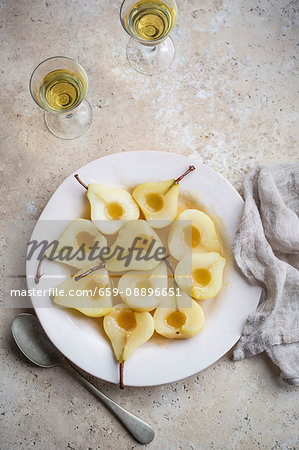 Poached pear halves (seen from above)