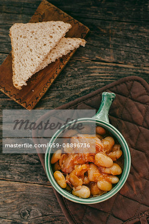 White beans with pork and bread slices