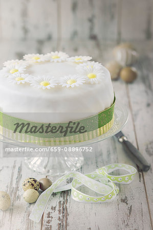 Easter cake with white icing flowers