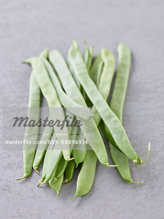 Green beans on a grey background