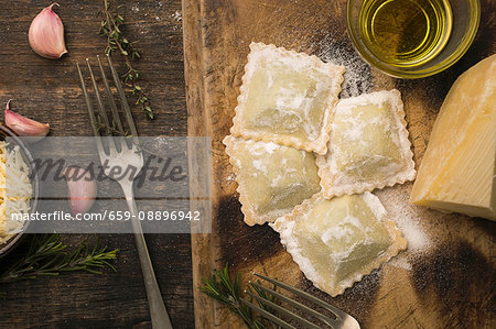 Handmade ravioli stuffed with parmigiano cheese and chicken Handmade ravioli stuffed with parmigiano cheese and chicken