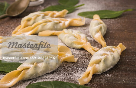 Turtei, a braided ravioli made with fresh eggs and semolina filled with ricotta and spinach