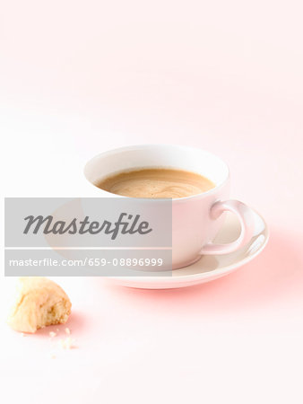 Cup of Coffee with Milk on Saucer Cup of Coffee with Milk on Saucer