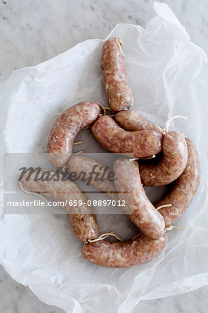 Spicy Christmas sausages on paper